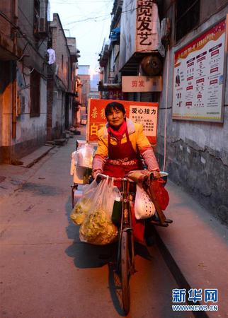 “爱心煎饼”夫妻九年来的别样人生